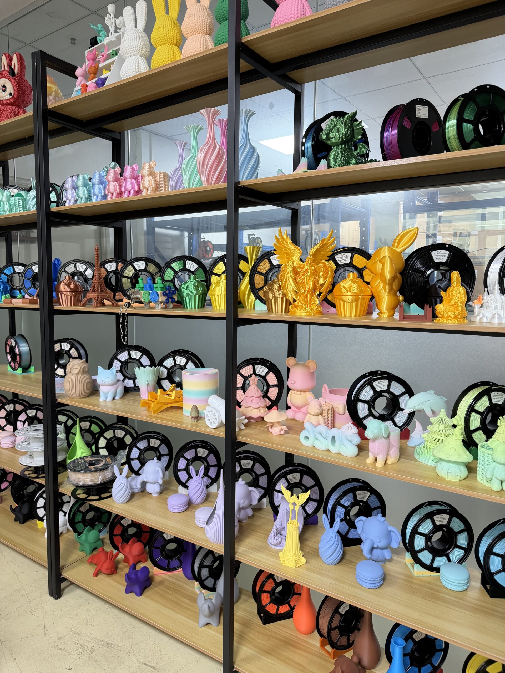 Physical colour references beside Matte PLA samples under neutral light